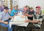 Lloyd Schleicher and Clifford Bartz each celebrated birthdays on July 15th at the McIntosh Heritage and Arts Center Heritage Homestead event at the Curt Bartz farm where there was a hearty breakfast served to all, and birthday cake too!