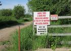 The McIntosh "Green Dump" is clearly marked with signage stating that the area is used for yard waste only.